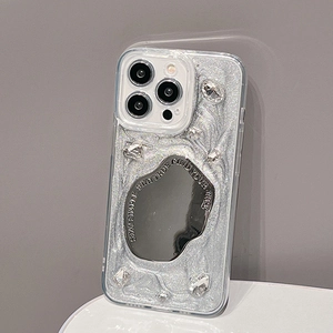 Detail of silver glitter iPhone case with irregular mirror and rhinestone accents