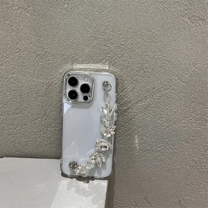 Transparent iPhone case with luxury rhinestone leaf chain and silver metal camera protection