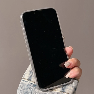 Close-up of glittery silver phone case for iPhone with shiny diamond rhinestones
