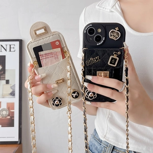 Quilted leather phone case with camellia decor and crossbody chain for iPhone 16