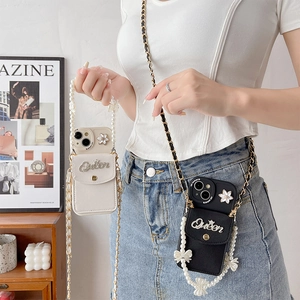Floral wallet case for iPhone with Queen lettering, pearl bow strap and crossbody chain