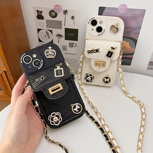 Luxury iPhone quilted wallet case with gold crown and rock charms on long crossbody chain