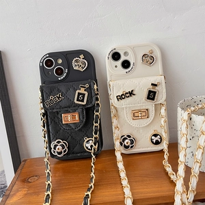 Detail of camellia flower lock and metal chain strap on quilted leather phone case