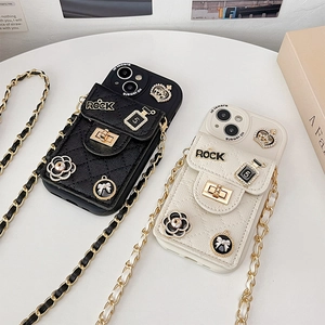 Detail of camellia lock wallet phone case with gold chain strap for iPhone 16 Pro Max