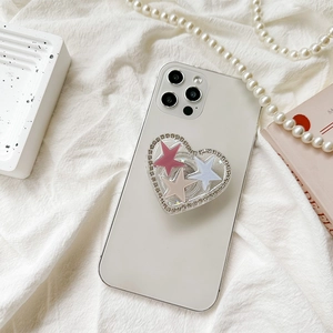 Glitter star heart phone socket with rhinestones on a white phone case background