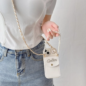 White leather wallet case for iPhone with pearl strap and Queen rhinestone detail