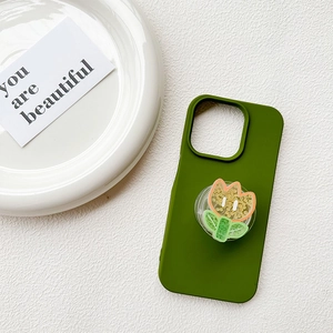 Detail of green silicone phone case with a floral tulip expandable air cushion stand