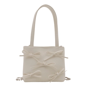 Creamy white rectangular shoulder bag with five delicate bows and silver chain strap