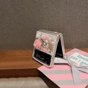 Detailed view of Z Flip6 case with luxury 3D resin roses, pearls, and crystals