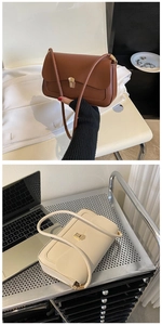 Modern caramel and beige underarm bags with sleek metal buckles and leather texture