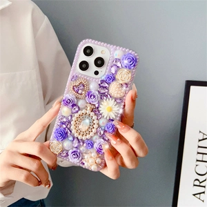 Handmade iPhone case with purple resin roses, daisies, pearls and rhinestones decoration
