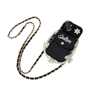 Black wallet phone case with pearl strap and metal chain for iPhone, featuring Queen detail