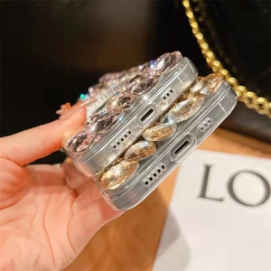 Detailed close-up of luxury rhinestones and precision cutouts on phone case