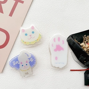 Three-piece acrylic cat phone socket set with cute white cat and pink paw designs