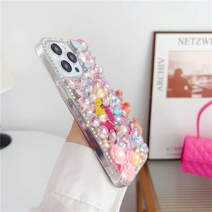 Detail of luxury iPhone case with pink rhinestones, pearls and 3D butterfly decor