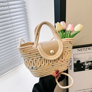 Woven tote bag with colorful dots, pearl clasp and scalloped texture in 2024 fashion
