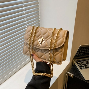 Quilted beige square bag with gold chain strap and metallic lock for daily fashion