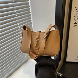 Minimalist khaki leather underarm baguette bag with metallic hook detail for women