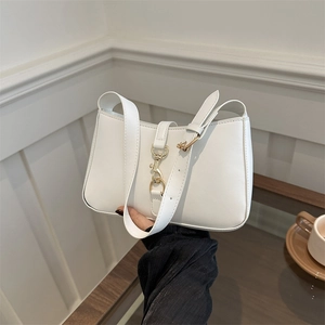 Elegant white leather baguette shoulder bag with gold piston clasp for 2024 spring style
