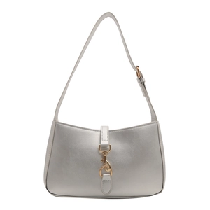Silver matte shoulder bag with a curved silhouette and golden metal hook closure
