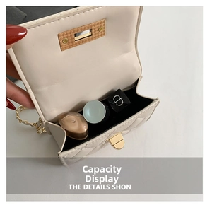 Detailed interior view of a cream quilted chain bag showing compact storage capacity