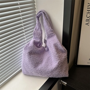 Lavender pleated tote bag with unique bubble texture and minimalist shoulder carry design