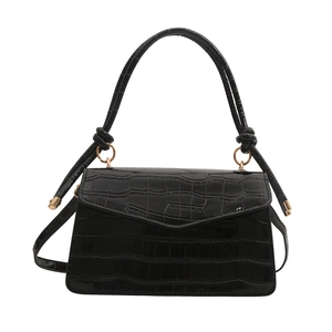 Glossy black crocodile pattern crossbody bag with knotted handle and golden ring hardware