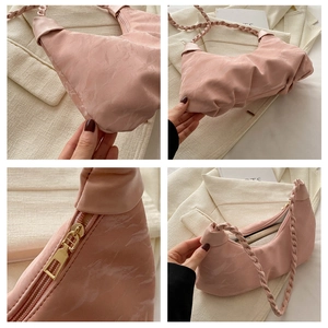 Detailed views of pink pleated shoulder bag showing texture, zipper, and interior space
