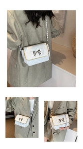 Detailed views of white quilted crossbody bag with silver bow and gold trim accents