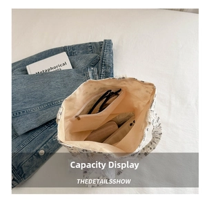 Interior view of floral canvas bucket bag showing large capacity and zipper pocket