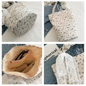 Floral tote bag detail featuring lace bow accent and internal zipper pocket storage