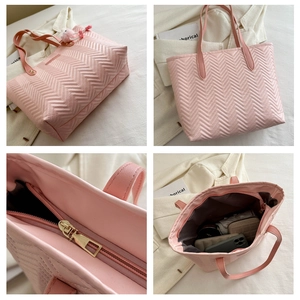 Dettaglio borsa shopper rosa trapuntata con cuciture a V e interno molto capiente