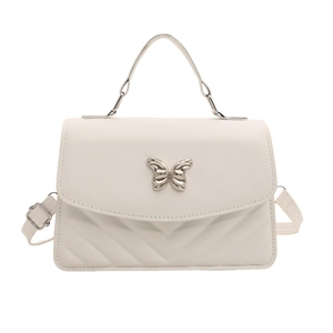 Minimalist white faux leather crossbody bag with silver butterfly buckle and V-quilt design