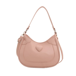 Chic pink hobo handbag with heart embossed design and adjustable shoulder strap