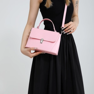 Pink minimalist leather crossbody square bag with top handle and silver lock