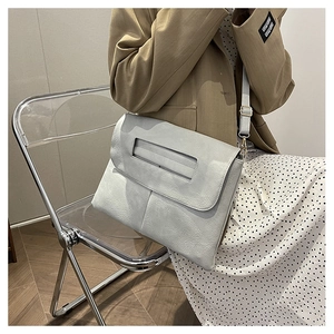 Minimalist soft PU leather tote bag with cutout handle and stitching detail for women