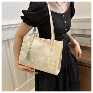 Elegant Chinese style silk tote bag with floral embroidery and green silk tassel