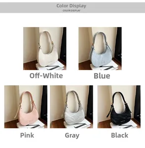 Color options of pleated crescent bags in off-white, blue, pink, grey, and black