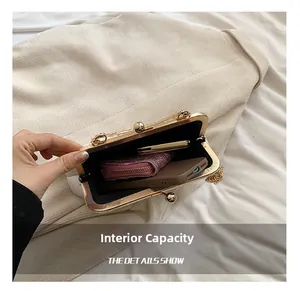 Interior view showing the capacity for a phone, wallet, and lipstick in this bag