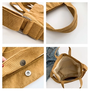 Macro detail of ginger corduroy tote bag showing metal buckle, magnetic snap and inner pocket