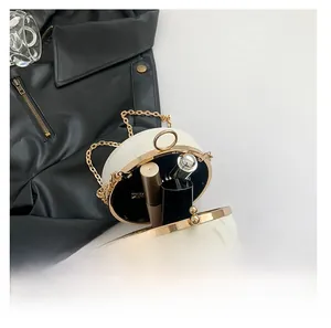 Detail showing the internal storage capacity of the marble patterned evening bag