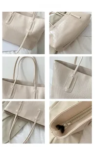 Vue détaillée du sac cabas blanc cassé avec texture crocodile et fermeture éclair