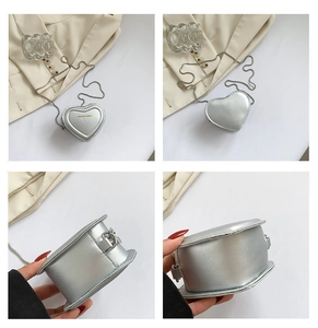 Multi-angle views of silver heart-shaped mini chain bag with metallic finish
