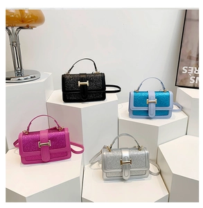 Glittery square crossbody bags shown in black, blue, rose purple, and silver colors