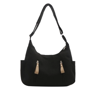 Large capacity black canvas tote bag with adjustable strap and dual front zipper pockets
