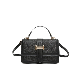 Elegant black sequin crossbody bag for women with gold clasp and leather handle