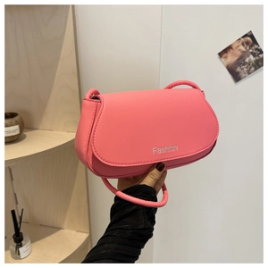 Pink minimalist saddle shoulder bag with silver Fashion lettering and flap closure