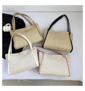 Detailed comparison of large straw tote bags in four neutral color combinations
