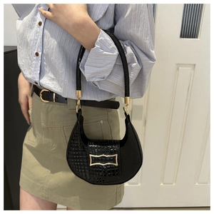 Chic black crocodile embossed crescent shoulder bag with golden lock for 2024 fashion