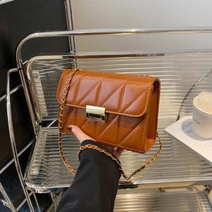 Classic brown quilted faux leather shoulder bag with gold chain strap and metal clasp